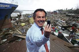 Riding on the back of the poor:  Former British PM Blair.  Smiling all the way to the bank?